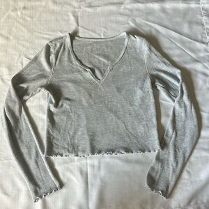 American Eagle, long sleeve Henley cropped t shirt, w/“lettuce” edge trim